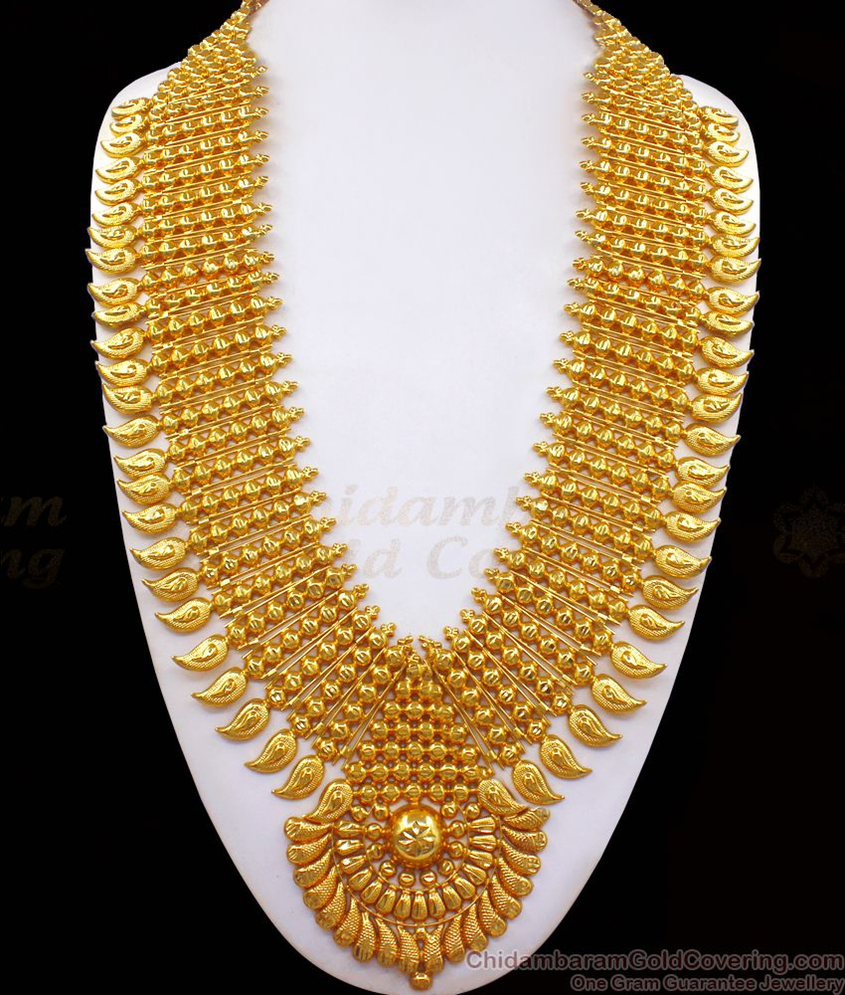 Attractive Kerala Style Grand Gold Haram Bridal Wear Hr