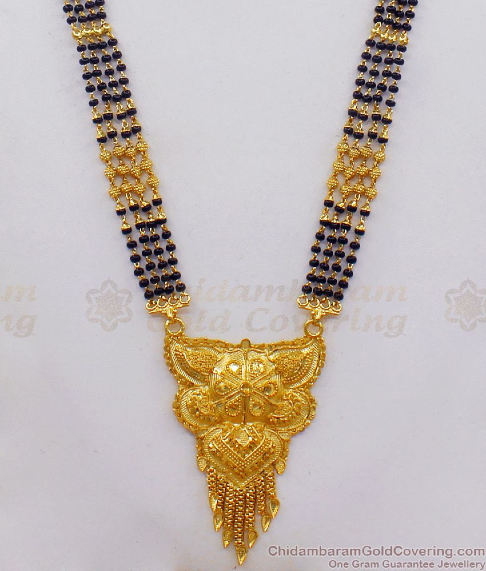 Traditional Four Line Forming Gold Black Beads Mangalsutra Long Chain ...